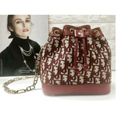 Bolso tipo cubo con cordón Dior Diorissimo en color burdeos
