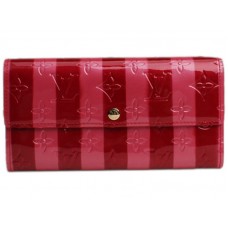 Cartera Louis Vuitton con monograma Vernis Rayures Sarah y pompón