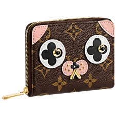 Monedero con cremallera de lona Monogram de Louis Vuitton: un perro adorable